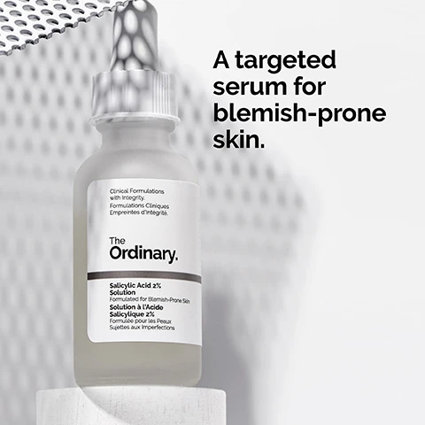 Image 1 - A clear glass bottle of The Ordinary Salicylic Acid 2% Solution serum is displayed on a light background, with text that reads A targeted serum for blemish-prone skin.
Image 2 - A close-up image of a clear water-based serum with bubbles, featuring text that reads 2% salicylic acid targets textural irregularities while removing dead skin cells and Water-based serum texture.
Image 3 - A close-up of a mans face showing his cheek and finger pointing at it, with text that reads Apply daily in the evening. Use a small amount for general use.
Image 4 - Image shows various skincare products arranged in three horizontal categories: PREP with cleansers and toners, TREAT featuring water-based serums and oils, and SEAL with suspensions and moisturizers; text includes category titles and specific product types.