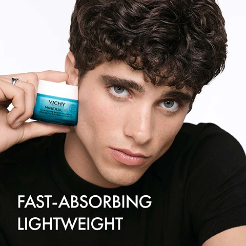 Image 1 - A young man with curly hair holds a blue jar of Vichy Mineral 89 Moisture Boosting Cream close to his face, with the text FAST-ABSORBING LIGHTWEIGHT displayed below.
Image 2 - Image shows three jars of Vichy Mineral 89 day creams labeled with their hydration properties: 48H Matte Sorbet for oily skin, 72H Moisture Boosting Cream for all skin types, and 100H Rich Cream for dry skin, with the header Choose the Right Day Cream For Your Skin Type above.
Image 3 - Image shows three skincare products with labeled steps: a bottle of Vichy Mineral 89 Boosting Serum, a jar of Vichy Mineral 89 72h Moisture Boosting Cream, and a tube of Vichy Mineral 89 SPF 50+ Daily Fluid, with text that reads step 1 strengthen, step 2 moisturise, and step 3 protect.