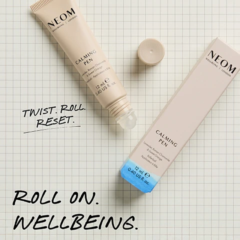 Image 1 - A light pink Neom Calming Pen, an uncapped roll-on, with its cap next to it, and its product box are displayed on a cream grid background, featuring text on the pen and box including NEOM WELLBEING | LONDON CALMING PEN Lavender, Roman Chamomile & Sweet Orange Rollerball - Applicateur à Bille 12 mL e 0.40 US fl. oz., alongside additional background text stating TWIST. ROLL. RESET. ROLL ON. WELLBEING. Image 2 - A Neom Calming Pen rollerball tube with its cap off is shown next to its product box, displaying visible text 81% SAID IT HELPED CREATE A SELF-CALMING RITUAL* and *Independent blind study over 2 weeks on 52 people, along with the product details NEOM WELLBEING | LONDON, CALMING PEN, Lavender, Roman Chamomile & Sweet Orange Rollerball - Applicateur à Bille, 12 mL e 0.40 US fl. oz. Image 3 - A hand holds a beige Neom Calming Pen against a light blue background, with text reading 100% natural fragrances. Lavender, Roman Chamomile, Sweet Orange. Roll onto pulse points whenever you need a moment of calm. I like the instant calmness. NEOM WELLBEING | LONDON CALMING PEN Lavender, Roman Chamomile & Sweet Orange Rollerball - Applicateur à Bille 12 mL e 0.40 US fl. oz. *Independent blind study over 2 weeks on 52 people.