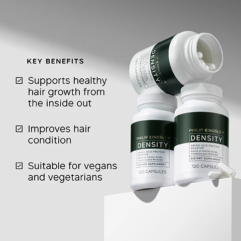 Image 1 - Three white Philip Kingsley Density supplement bottles are shown, one open with white capsules spilling out, alongside text listing Key Benefits: Supports healthy hair growth from the inside out, Improves hair condition, Suitable for vegans and vegetarians, and bottle labels stating Philip Kingsley Density Amino Acid Protein Booster blend of Amino Acids, Vitamins and Minerals Dietary Supplement 120 Capsules. Image 2 - A hand holds a white bottle with a dark green label, showing text Philip Kingsley Density Amino Acid Protein Booster A blend of Amino Acid, Vitamins and Minerals Dietary Supplement 120 Capsules, alongside a list of Key Ingredients: Amino Acids A blend of amino acids, the key building blocks of proteins like keratin; Biotin Contributes to the maintenance of healthy hair; Copper Aids in the maintenance of normal hair colour; and Vitamin C An antioxidant which contributes to collagen formation, to support the optimal function of the skin. Image 3 - A pile of white capsules on a grey background with text that reads: TRICHOLOGIST TIP Consistency is key, take daily. And be patient — visible improvements in hair quality can take up to three months, however youll likely see faster results in your nails. Image 4 - A persons hand holds two white capsules while more capsules spill from an open bottle labeled Philip Kingsley DENSITY, next to a glass of water on a marble surface, with the text HOW TO TAKE Take two capsules, twice a day visible on the right. Image 5 - A persons hand holds a light beige capsule, next to a customer review that states These are the only supplements that work to stop my hair falling out. The DIFFERENCE I’ve noticed after a year is INCREDIBLE. My hair has thickened slightly but I think it’s because my hair isn’t falling or breaking now. My HAIR IS SO MUCH LONGER than it was before taking these too. CUSTOMER REVIEW.